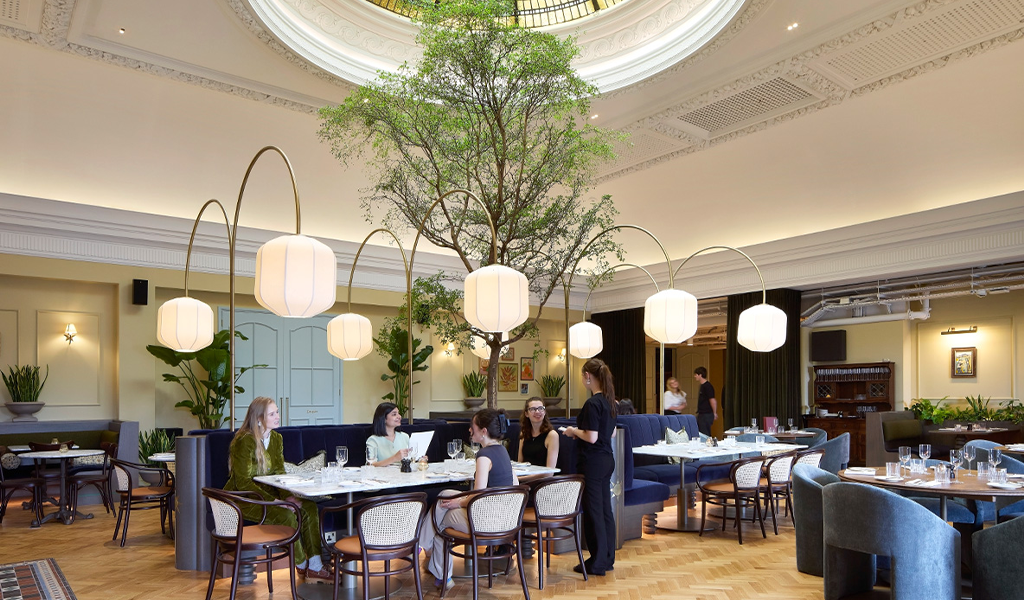 a light and airy restaurant with vast domed, stain-glass roof life in the centre