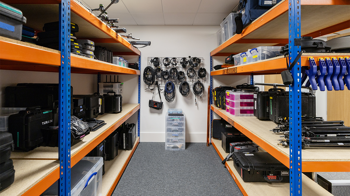 Shot of metal shelving and kit in film kit hire room